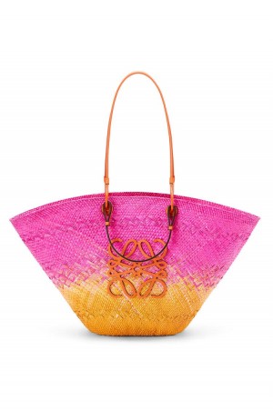 Bolso Tote Loewe Large Anagram Basket bag in iraca palm and calfskin Mujer Fucsia Naranjas | 290BMOSJP