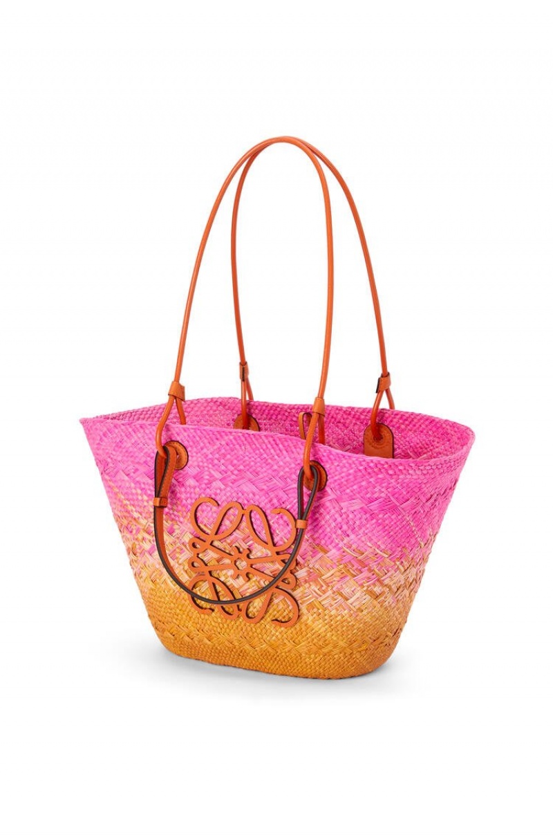 Bolso Tote Loewe Anagram Basket bag in iraca palm and calfskin Mujer Fucsia Naranjas | 927BTAVLJ