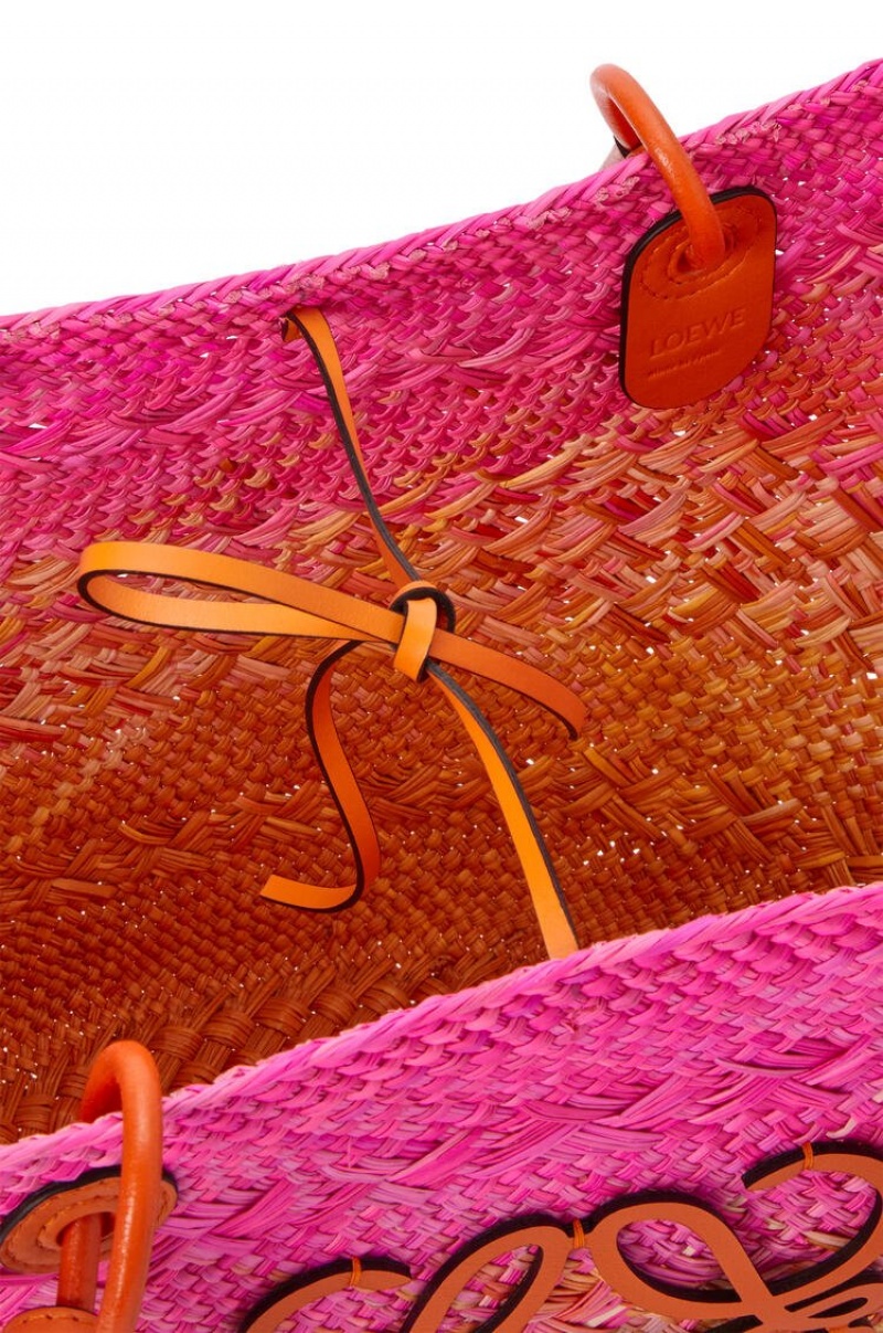 Bolso Tote Loewe Anagram Basket bag in iraca palm and calfskin Mujer Fucsia Naranjas | 927BTAVLJ