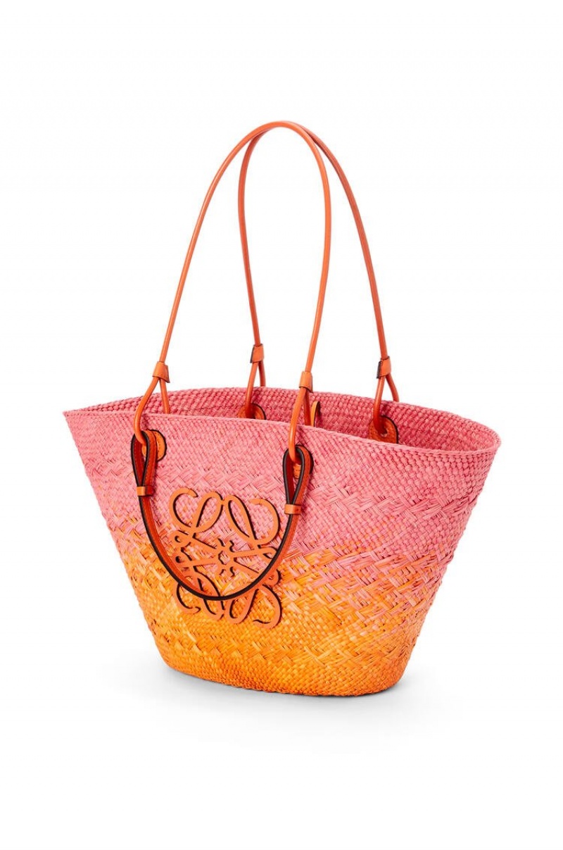 Bolso Tote Loewe Anagram Basket bag in iraca palm and calfskin Mujer Rosas Naranjas | 196TWXKHS