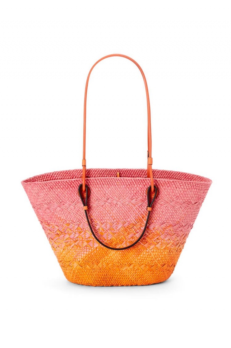 Bolso Tote Loewe Anagram Basket bag in iraca palm and calfskin Mujer Rosas Naranjas | 196TWXKHS