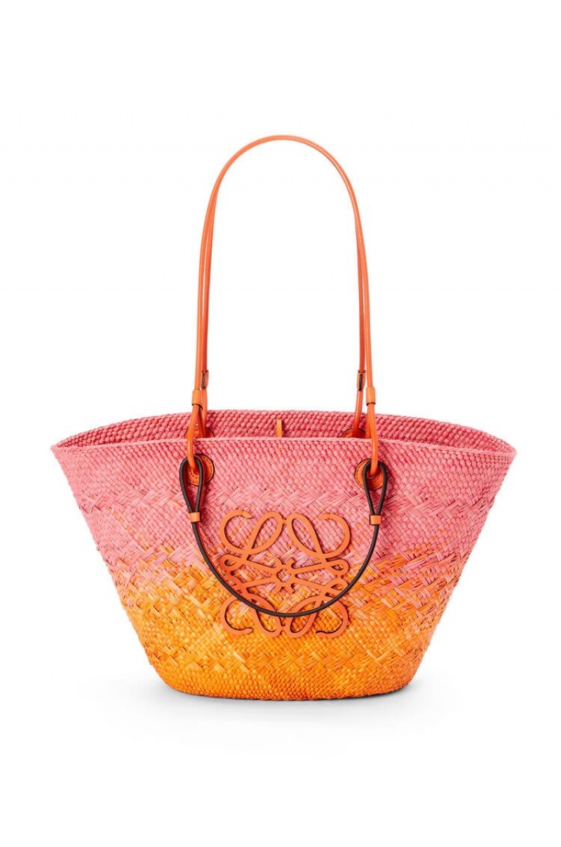 Bolso Tote Loewe Anagram Basket bag in iraca palm and calfskin Mujer Rosas Naranjas | 196TWXKHS