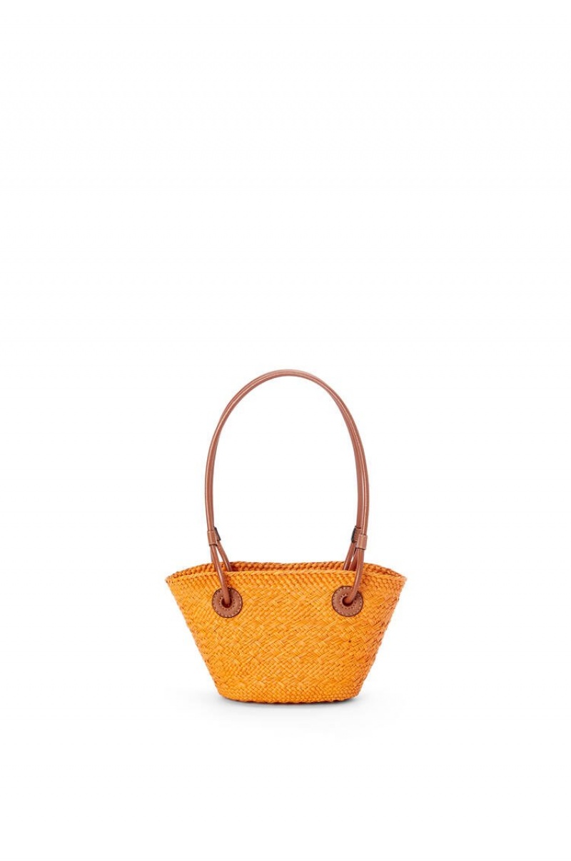 Bolsos Mini Loewe Mini Anagram Basket bag in iraca palm and calfskin Mujer Naranjas | 705AUIZKP